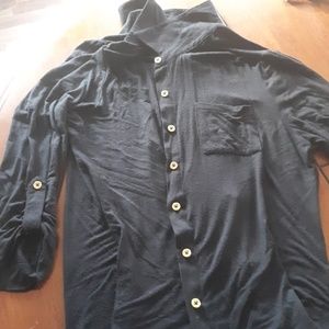 Black shirt with gols buttons